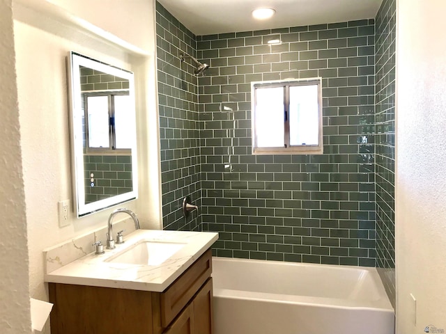 275 E 26th St, Yuma, AZ 85364 - bathroom with bathing tub / shower combination, a textured wall, and vanity