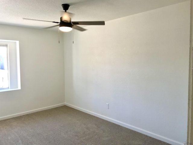275 E 26th St, Yuma, AZ 85364 - spare room with baseboards, carpet, and ceiling fan