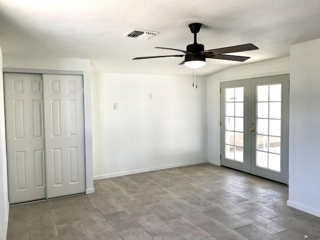 275 E 26th St, Yuma, AZ 85364 - interior space with baseboards, a ceiling fan, french doors, and visible vents