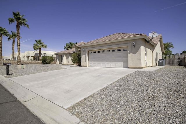14158 E 49th Dr, Yuma, AZ 85367 - single story home with fence, an attached garage, concrete driveway, and stucco siding