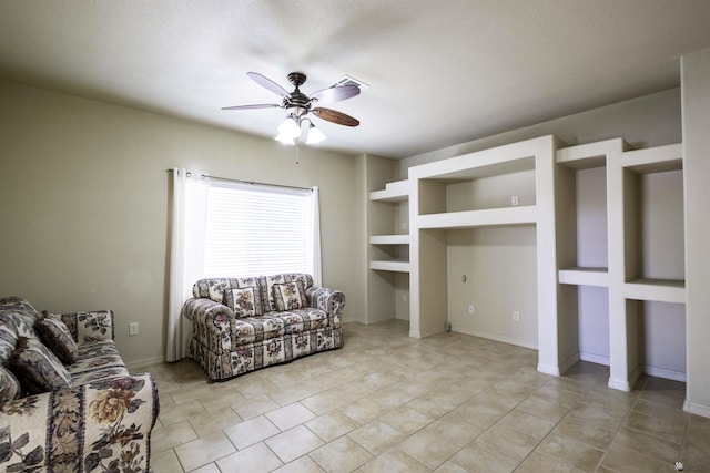 14158 E 49th Dr, Yuma, AZ 85367 - living room with baseboards, a ceiling fan, and light tile patterned flooring