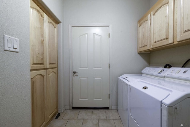 14158 E 49th Dr, Yuma, AZ 85367 - laundry room featuring cabinet space, light tile patterned flooring, and washer and dryer