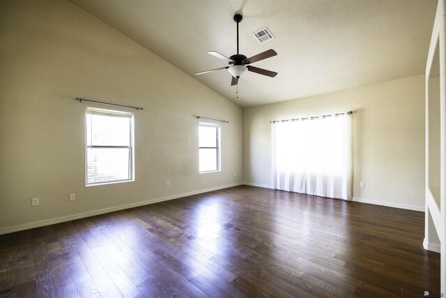 14158 E 49th Dr, Yuma, AZ 85367 - unfurnished room featuring visible vents, baseboards, ceiling fan, dark wood-style floors, and high vaulted ceiling