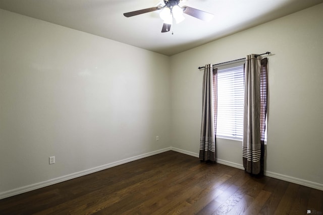 14158 E 49th Dr, Yuma, AZ 85367 - spare room featuring baseboards, dark wood-style flooring, and ceiling fan