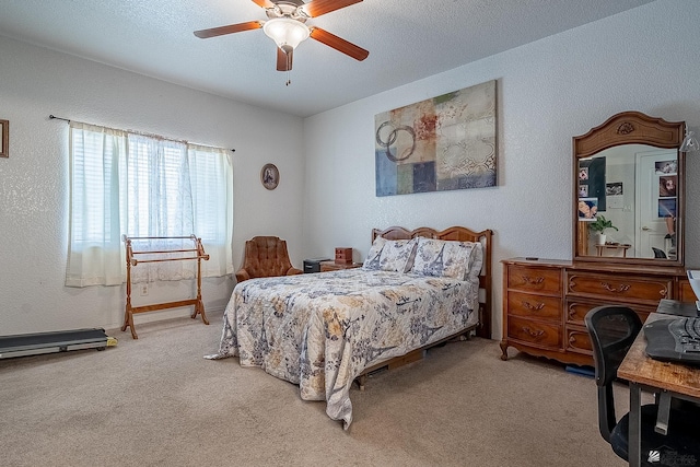 14307 E 49th Ln, Yuma, AZ 85367 - carpeted bedroom featuring a textured wall and a ceiling fan