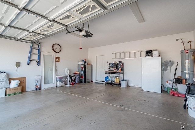 14307 E 49th Ln, Yuma, AZ 85367 - garage with water heater, a garage door opener, and freestanding refrigerator
