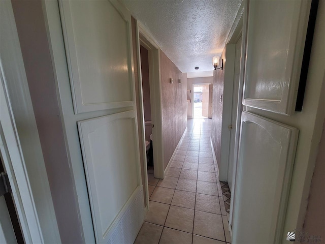 2082 E Ln Mesa St, Yuma, AZ 85365 - hall with a textured ceiling and light tile patterned floors