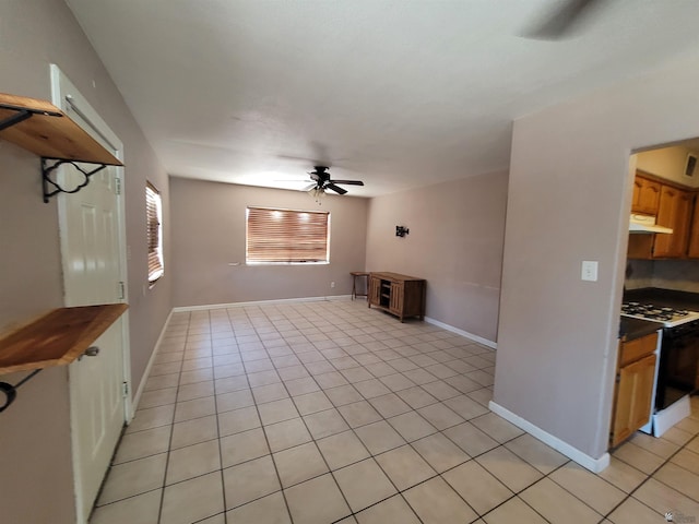 2082 E Ln Mesa St, Yuma, AZ 85365 - unfurnished living room with a ceiling fan and light tile patterned floors