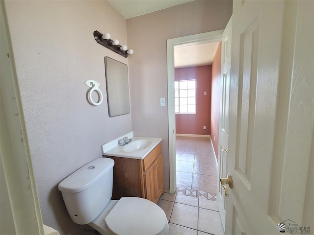 2082 E Ln Mesa St, Yuma, AZ 85365 - bathroom featuring vanity, tile patterned flooring, and toilet