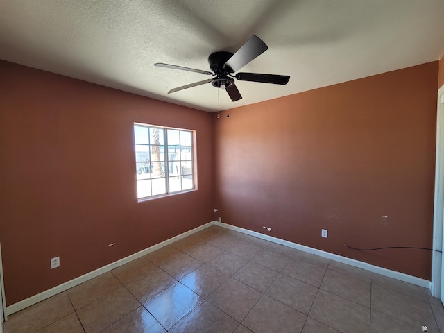 2082 E Ln Mesa St, Yuma, AZ 85365 - tiled spare room featuring ceiling fan and a textured ceiling