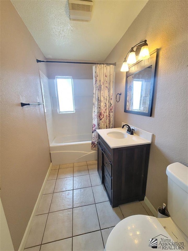 2082 E Ln Mesa St, Yuma, AZ 85365 - full bath with shower / tub combo, vanity, tile patterned flooring, a textured ceiling, and a textured wall