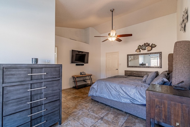 bedroom with high vaulted ceiling and ceiling fan