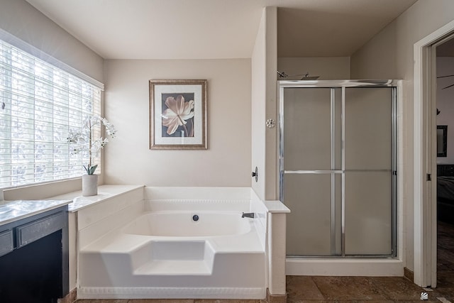 bathroom with plus walk in shower and vanity