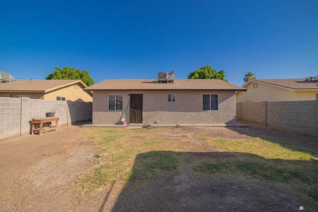 3168 W 31st Ln, Yuma, AZ 85364 - rear view of house with stucco siding