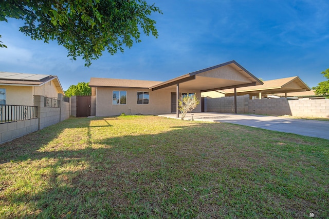 3168 W 31st Ln, Yuma, AZ 85364 - view of front of home with concrete driveway, an attached carport, and stucco siding