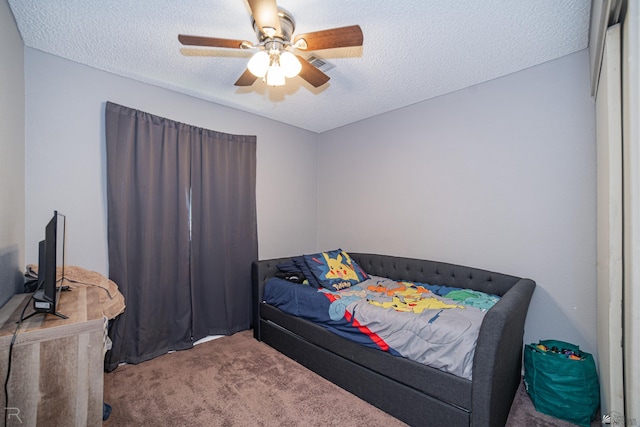 3168 W 31st Ln, Yuma, AZ 85364 - bedroom featuring carpet flooring, a textured ceiling, and ceiling fan