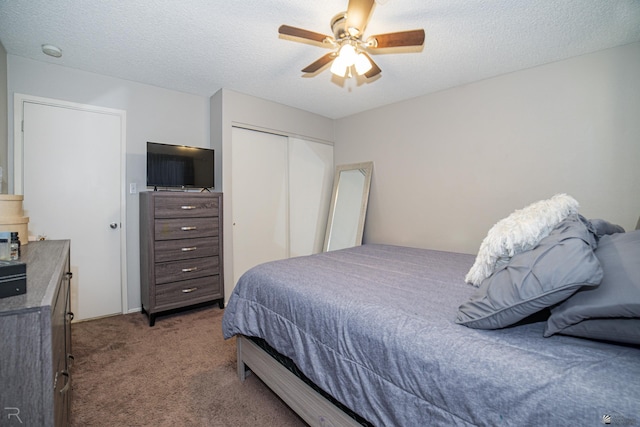 3168 W 31st Ln, Yuma, AZ 85364 - carpeted bedroom with a closet, a textured ceiling, and a ceiling fan