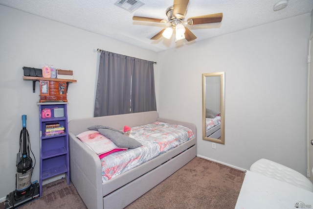 3168 W 31st Ln, Yuma, AZ 85364 - bedroom featuring carpet floors, ceiling fan, and a textured ceiling