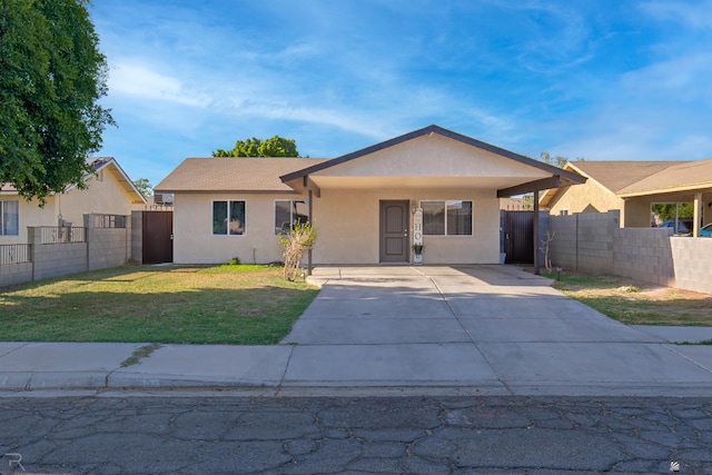 3168 W 31st Ln, Yuma, AZ 85364 - view of front facade with concrete driveway, stucco siding, and a gate