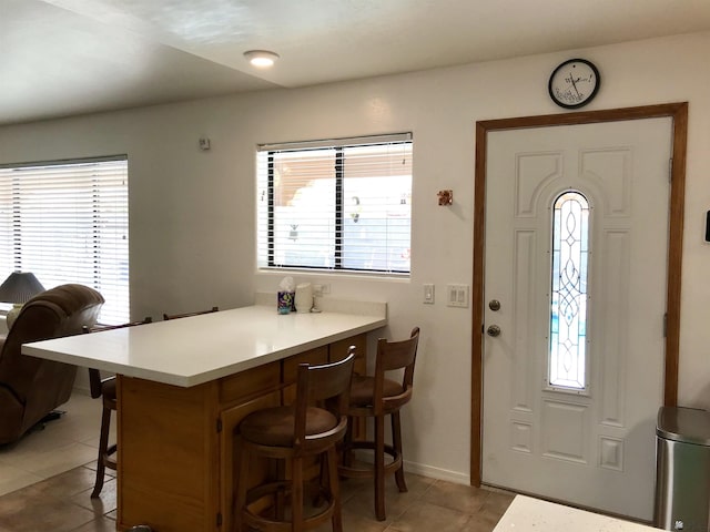 11551 E Via Salida, Yuma, AZ 85367 - entryway with light tile patterned flooring and baseboards