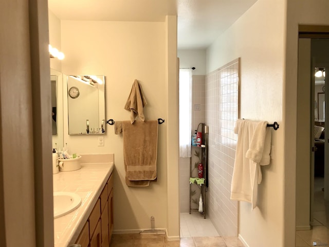 11551 E Via Salida, Yuma, AZ 85367 - full bathroom featuring baseboards, walk in shower, tile patterned flooring, and vanity