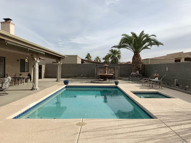 11551 E Via Salida, Yuma, AZ 85367 - view of pool featuring a patio, an in ground hot tub, a fenced in pool, and a fenced backyard