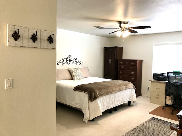 11551 E Via Salida, Yuma, AZ 85367 - bedroom featuring a ceiling fan, visible vents, and light carpet