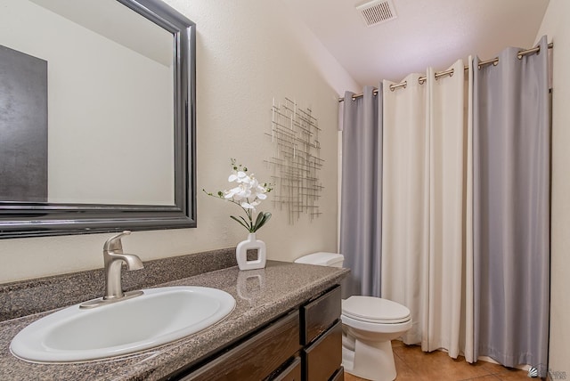 full bathroom with a shower with curtain, visible vents, tile patterned flooring, vanity, and toilet