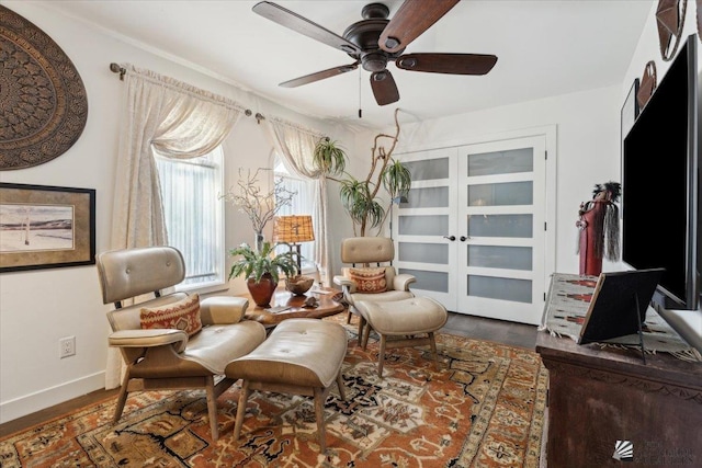 1925 S Ridgeview Dr, Yuma, AZ 85364 - living area with baseboards, ceiling fan, and wood finished floors