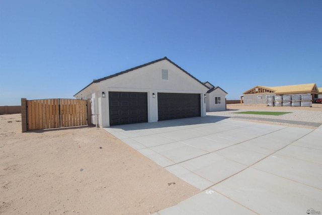 exterior space with a gate and fence