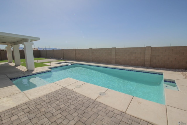view of pool with a fenced backyard, a fenced in pool, and a patio area