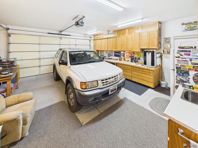 14340 E 49th Ln, Yuma, AZ 85367 - garage with a sink and a garage door opener