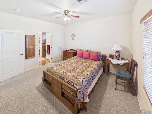 14340 E 49th Ln, Yuma, AZ 85367 - bedroom with ensuite bath, carpet, a ceiling fan, baseboards, and visible vents