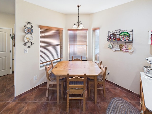 14340 E 49th Ln, Yuma, AZ 85367 - dining room with an inviting chandelier, baseboards, and tile patterned flooring