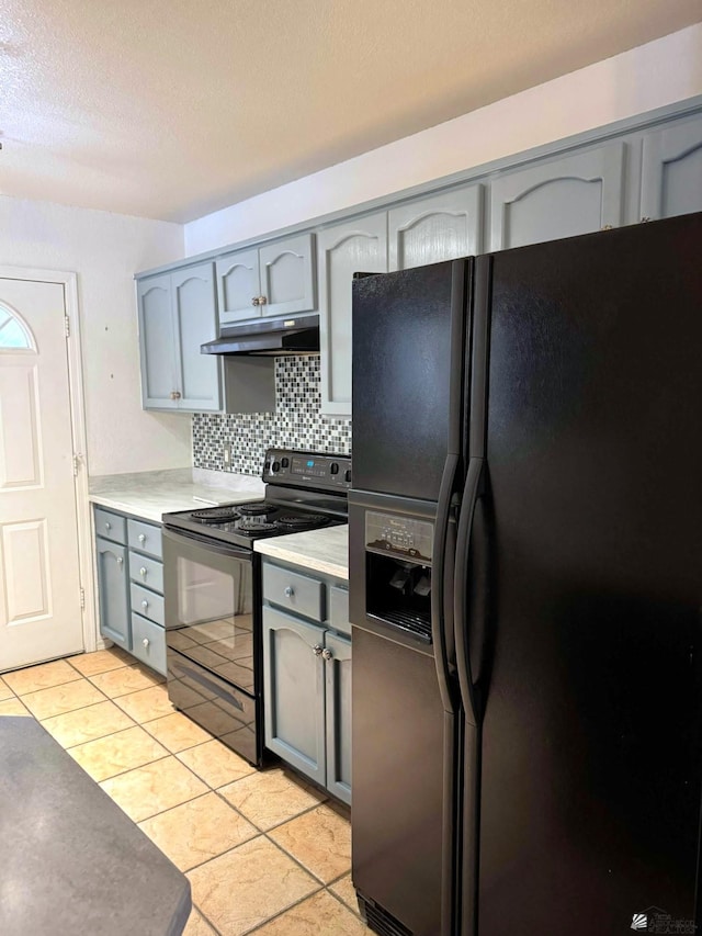 13458 E 53rd Ln, Yuma, AZ 85367 - kitchen featuring black appliances, gray cabinetry, and under cabinet range hood