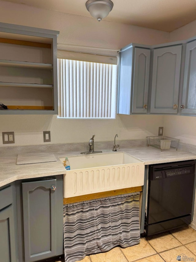13458 E 53rd Ln, Yuma, AZ 85367 - kitchen with a sink, black dishwasher, open shelves, light countertops, and gray cabinetry