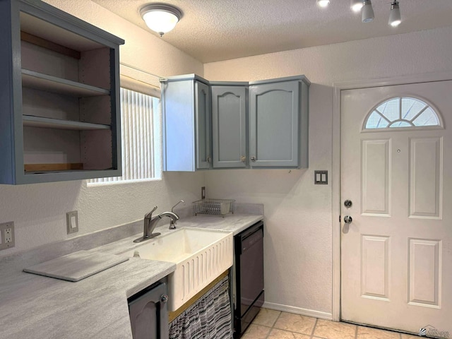 13458 E 53rd Ln, Yuma, AZ 85367 - kitchen featuring dishwasher, light countertops, a textured ceiling, a textured wall, and gray cabinets