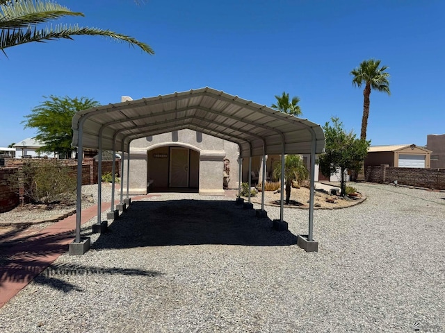 13458 E 53rd Ln, Yuma, AZ 85367 - view of parking / parking lot with a carport and driveway