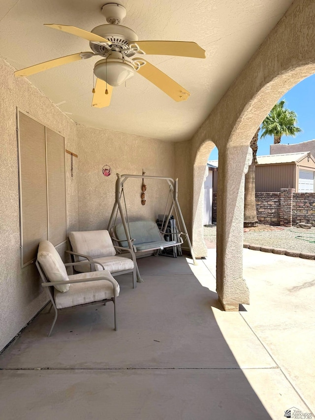 13458 E 53rd Ln, Yuma, AZ 85367 - view of patio / terrace with ceiling fan and fence