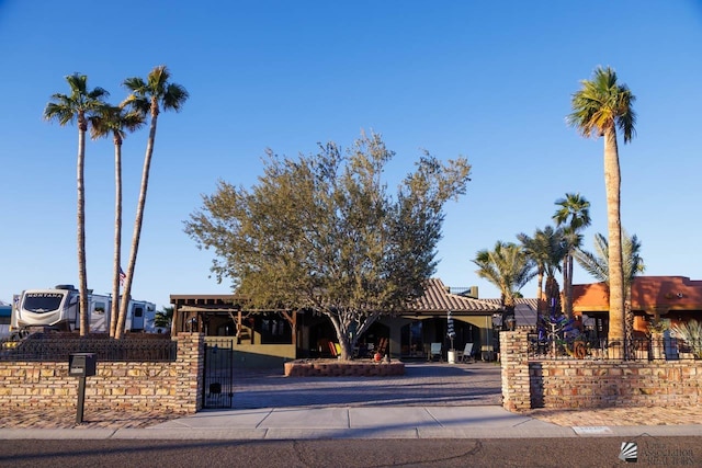 13220 E 55th St, Yuma, AZ 85367 - view of front facade with a gate and a fenced front yard
