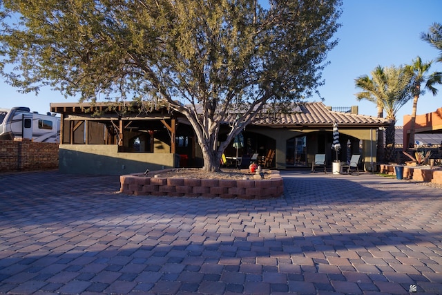 13220 E 55th St, Yuma, AZ 85367 - view of front of home with stucco siding and a tiled roof