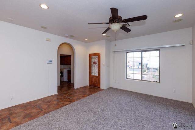 unfurnished room with ceiling fan, arched walkways, carpet, washer / clothes dryer, and recessed lighting