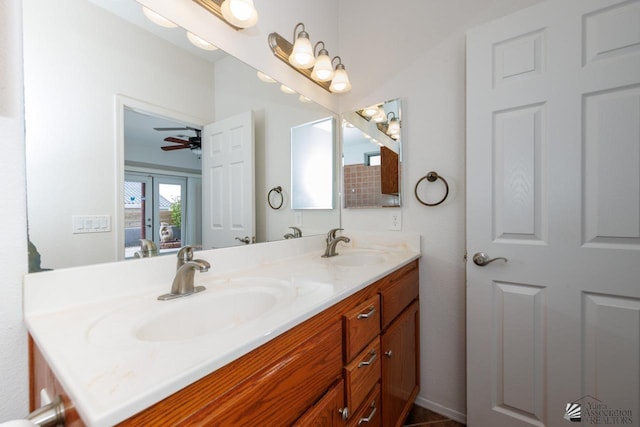 bathroom with double vanity and a sink