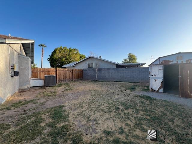 2232 W 19th St, Yuma, AZ 85364 - fenced backyard with a storage shed