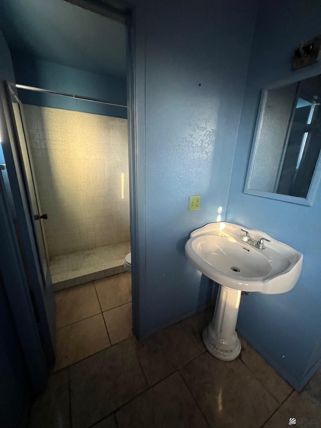 2232 W 19th St, Yuma, AZ 85364 - bathroom with a shower stall and tile patterned flooring