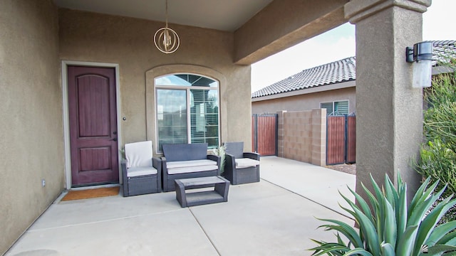 view of patio / terrace featuring fence