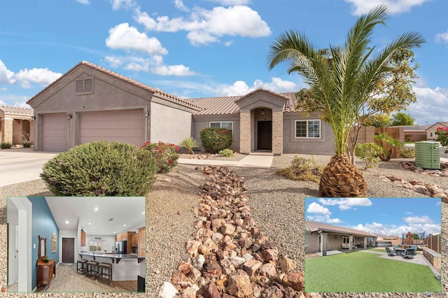5978 E 39th St, Yuma, AZ 85365 - view of front of house featuring stucco siding, an attached garage, a tile roof, and concrete driveway