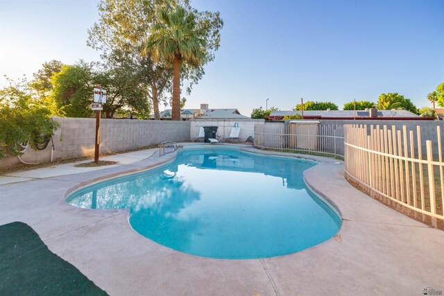 1836 W Allen St, Yuma, AZ 85364 - view of swimming pool featuring a fenced backyard