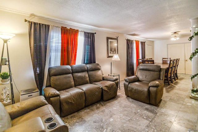 1836 W Allen St, Yuma, AZ 85364 - living room with a textured ceiling and ornamental molding