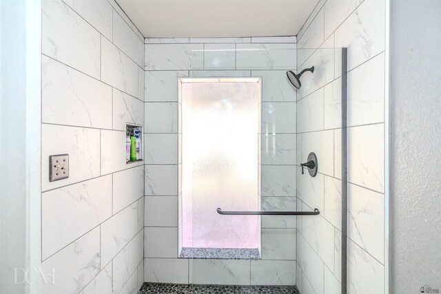 bathroom featuring a stall shower
